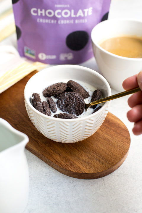 Chocolate cookie bites dipped in milk – gluten-free, vegan, and non-GMO verified.